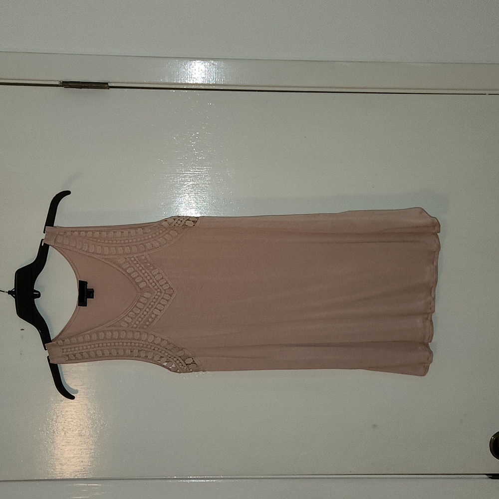 NWOT..Very pretty, sleeveless, light and airy top!
